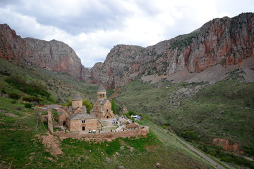 Fototapeta na wymiar Amazing view of Noravank monastery surrounded by red rocks in Armenia