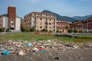 Plastic waste and rubbish on the beach in castellammare di stabia Italy - 232345474