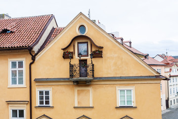 Fragment of  building on street Na Kampe near Charles Bridge in Prague, Czech Republic