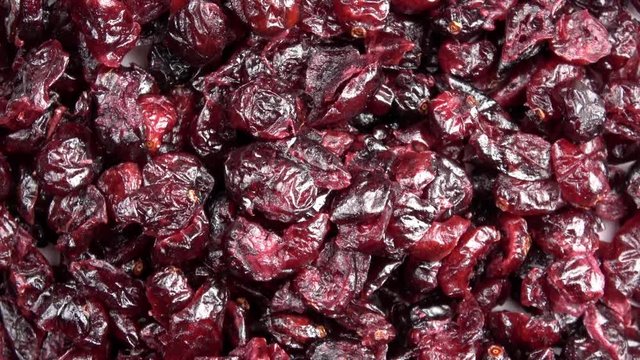 Dehydrated organic cranberries spinning video close up