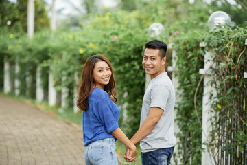 Young couple walking outdoors
