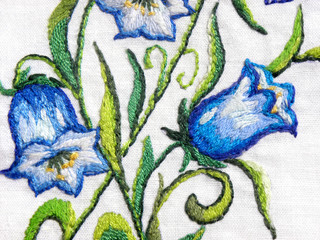 Ukrainian embroidery, embroidered blue bells on a white background