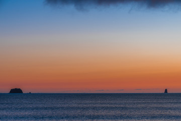 A tiny island on the horizon