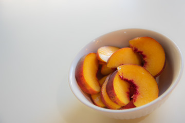fresh peaches in bowl