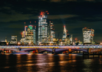London Blackfriars bridge skyscraper view by night over river thames