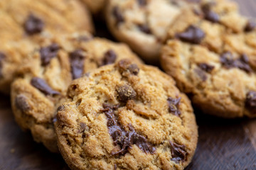 Details of a cookie with many drops of creamy and crunchy chocolate. Chocolate cookies.