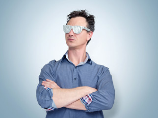 Confident man in shirt and aluminum glasses, visionary concept