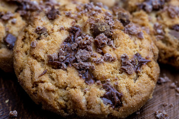 Details of a cookie with many drops of creamy and crunchy chocolate. Chocolate cookies.