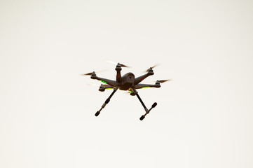 Flying drone in flight over a beautiful meadow    