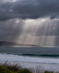 storm over the sea and rays on sunshine