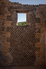 Brick pattern wall in roman Italy - 232363845
