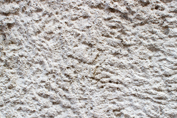White pluster cement wall.