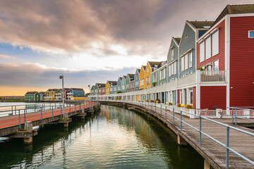Fototapeta na wymiar Dutch, modern, colorful vinex architecture style houses at waterside