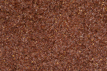Flax seeds background texture.