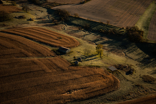 Aerial of farm land with a bard