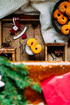 Swedish christmas. Gluten free version Traditional swedish buns in christmas setting. A saffron bun, in Swedish lussebulle or lussekatt. 