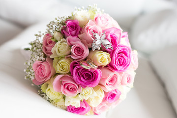 Wedding rings on the bouquet