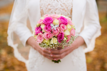 Bride holding wedding bouquet