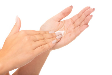 Woman hands with cream