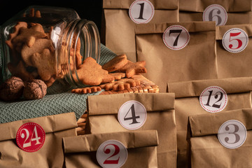 Jar with cookies and advent calendar