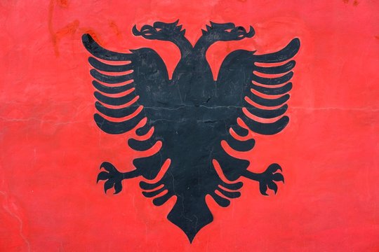 Double-headed eagle, Albanian flag painted on wall, Kucova, Albania, Europe