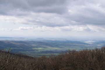 Rocks, bushes and fog in autumn Crimea mountains. Beautiful landscape.