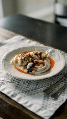 Ravioli with yogurt, paste, walnut and paste
