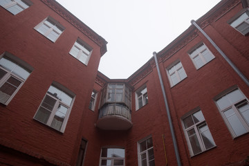 The building of the former factory of red brick, redone for offices, loft style