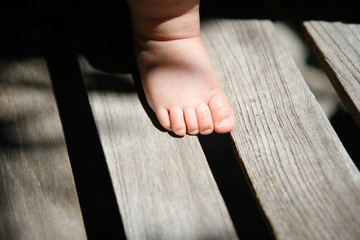Baby's Foot on Wood