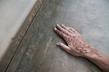 henna tattoo on women hands. Mehndi is traditional Indian decorative art. Close-up, top view