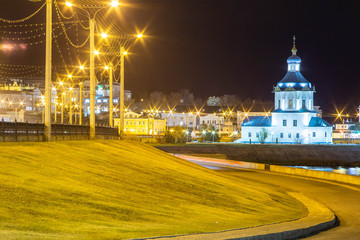 night view of the old town in Cheboksary in Russia with the assumption Church and Vvedensky Cathedral and the waters of the Volga river Bay