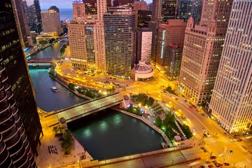 Aerial view of downtown Chicago after sunset at the blue hour. Wacker Drive, Michigan Avenue,...