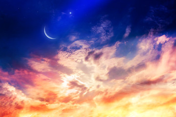 Naklejka na ściany i meble Dramatic nature background . new moon . Prayer time . Generous Ramadan . Mubarak background . Glowing sunset . Sunset or sunrise with clouds . The sky at night with stars. 