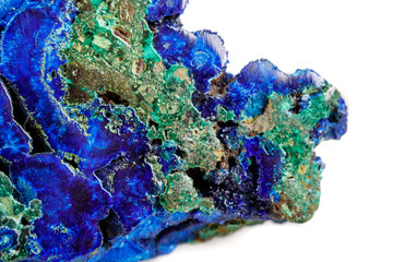 Macro mineral stone malachite with azurite on white background