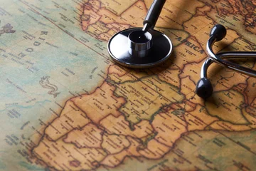  Medical stethoscope over Africa healthcheck. close-up map © Gecko Studio