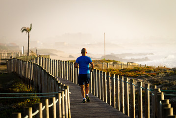 Man Runs on Boardwalk