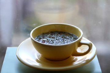 Tea mix in a yellow cup. Selective focus. 