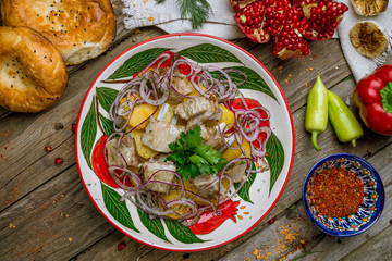 potatoes with fat tail on the grill