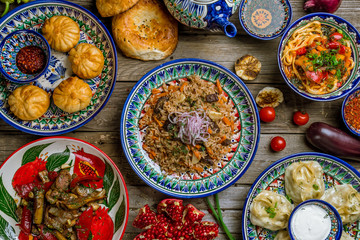 dishes of Uzbek cuisine lagman, pilaf, manti - obrazy, fototapety, plakaty