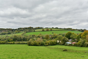 Obraz premium landscape with field and cloudy sky