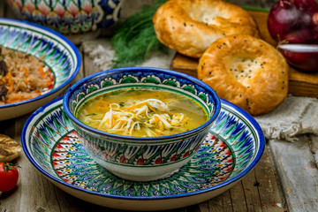 Chicken soup bouillon in a plate