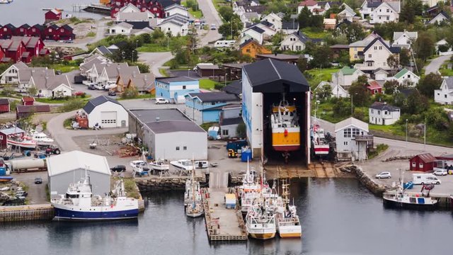 Shipyard and houses in the fishing town of Ballstad, Lofoten islands, Norway.