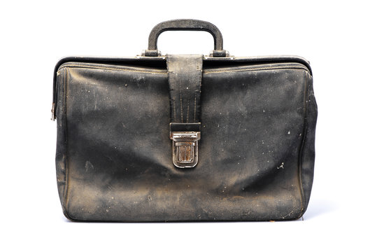 Leather retro briefcase, view in front, black color, flapover, isolated on white background with shadow