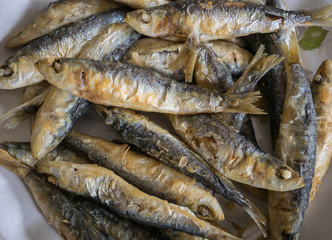 fresh roasted sardines close up