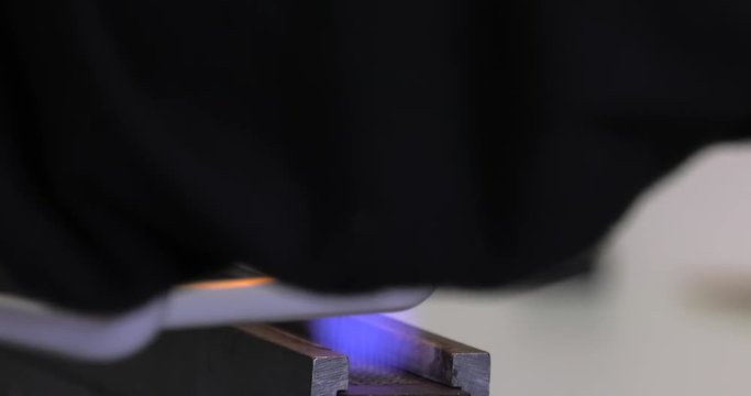 Male Hands Making neon lightbulbs. Hand Welding Glass Tubes. 4K, UHD, 50p, Cinematic,Close-up, 