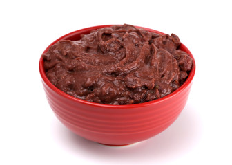 Bowl of Black Bean Dip on a White Background