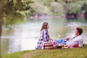 Couple in love enjoying picnic time