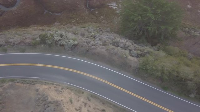 Cars driving on highway 1 in marin county near tomales bay