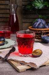 Transparent red drink in glass