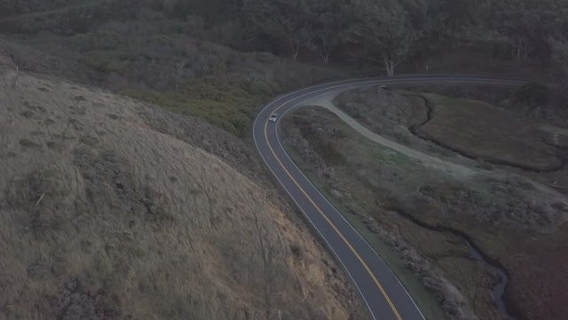 Cars driving on highway 1 in marin county near tomales bay